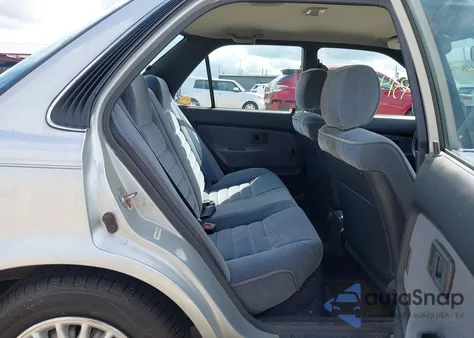 1991 Toyota Corolla Le/Dlx из США, поврежденный, VIN 1NXAE97A5MZ258498